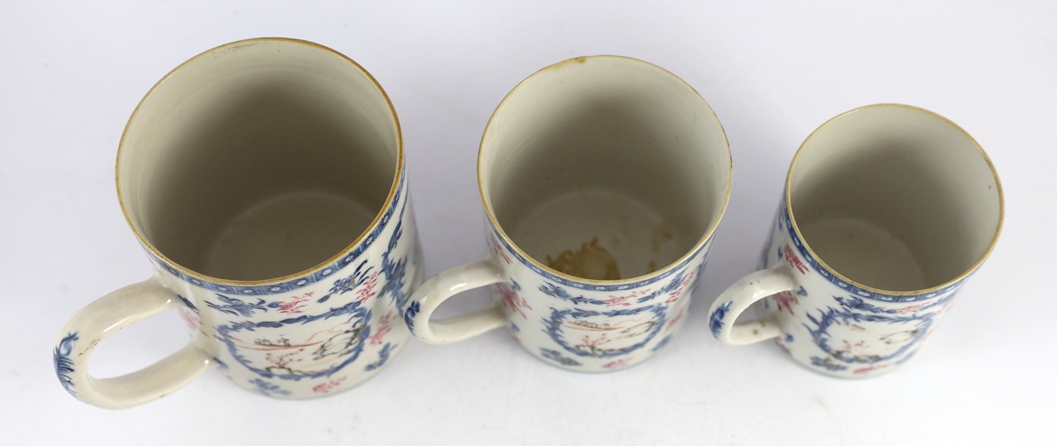 A graduated set of three Chinese famille rose mugs, Qianlong period